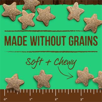  Power Bites Rabbit star shaped dog treats shown to scale on a ruler with a green background and the words “Made without grains” and “Soft and Chewy.” 