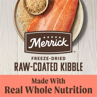 A topdown photo of brown rice and raw salmon on a speckled tan plate; the Merrick logo overlays the plate; text below reads "freeze-dried raw-coated kibble made with real whole nutrition"