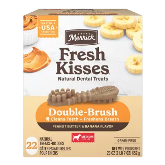The front of a 22 count box of Merrick Fresh Kisses Peanut Butter and Banana dental dog treats for medium size dogs.